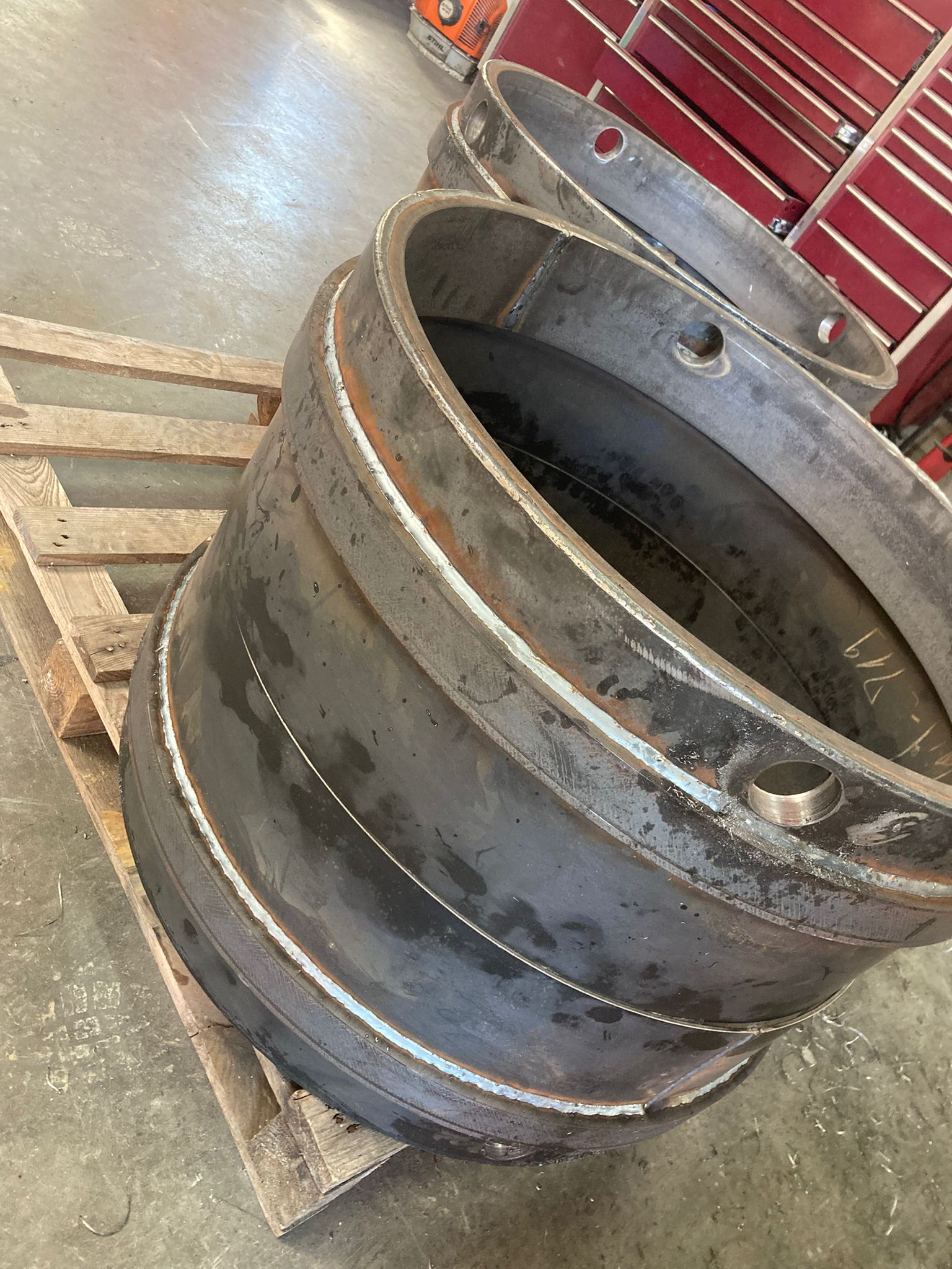 Close-up of a steel cutting ring for coated pipe protection